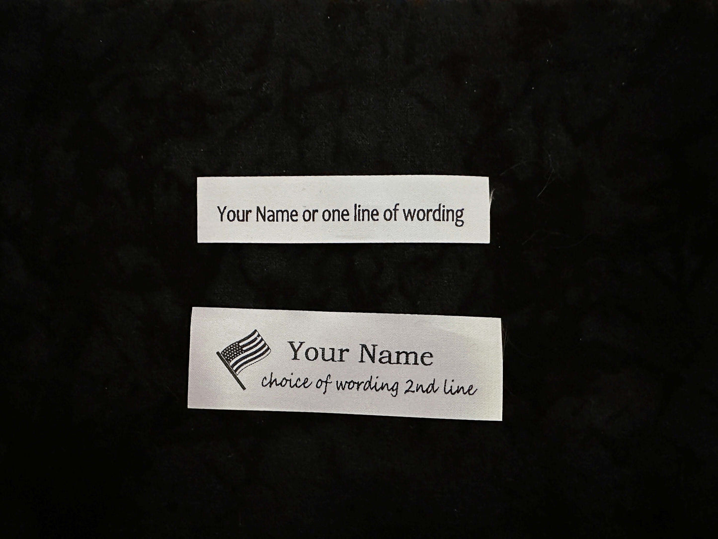 Custom printed satin ribbon labels with personalized text, sew on or sew into seam, shown with example text options on black background.