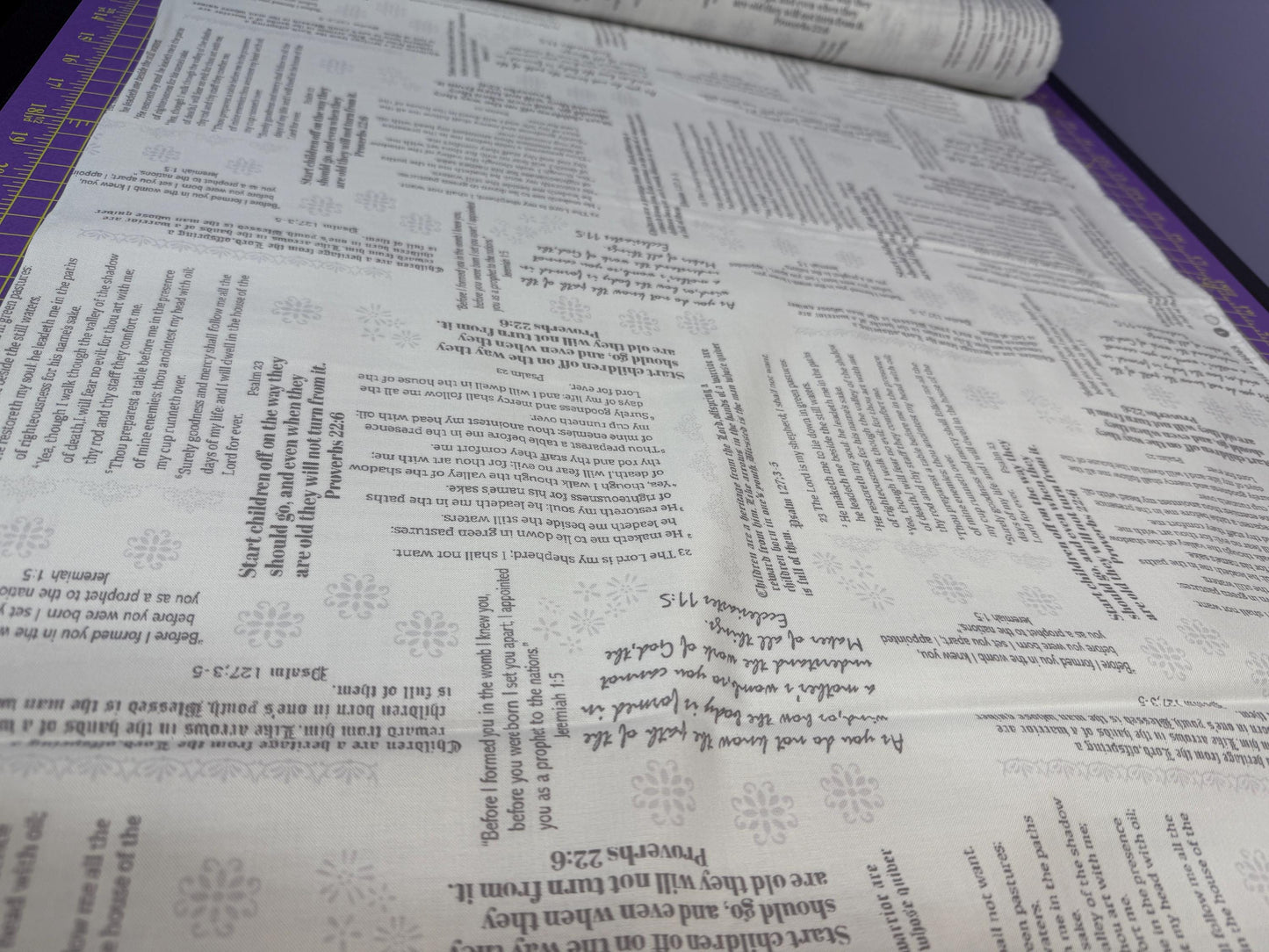 Simply Blessed Old Testament Cotton Fabric Benartex Quilting in white and grey text design for sewing projects.