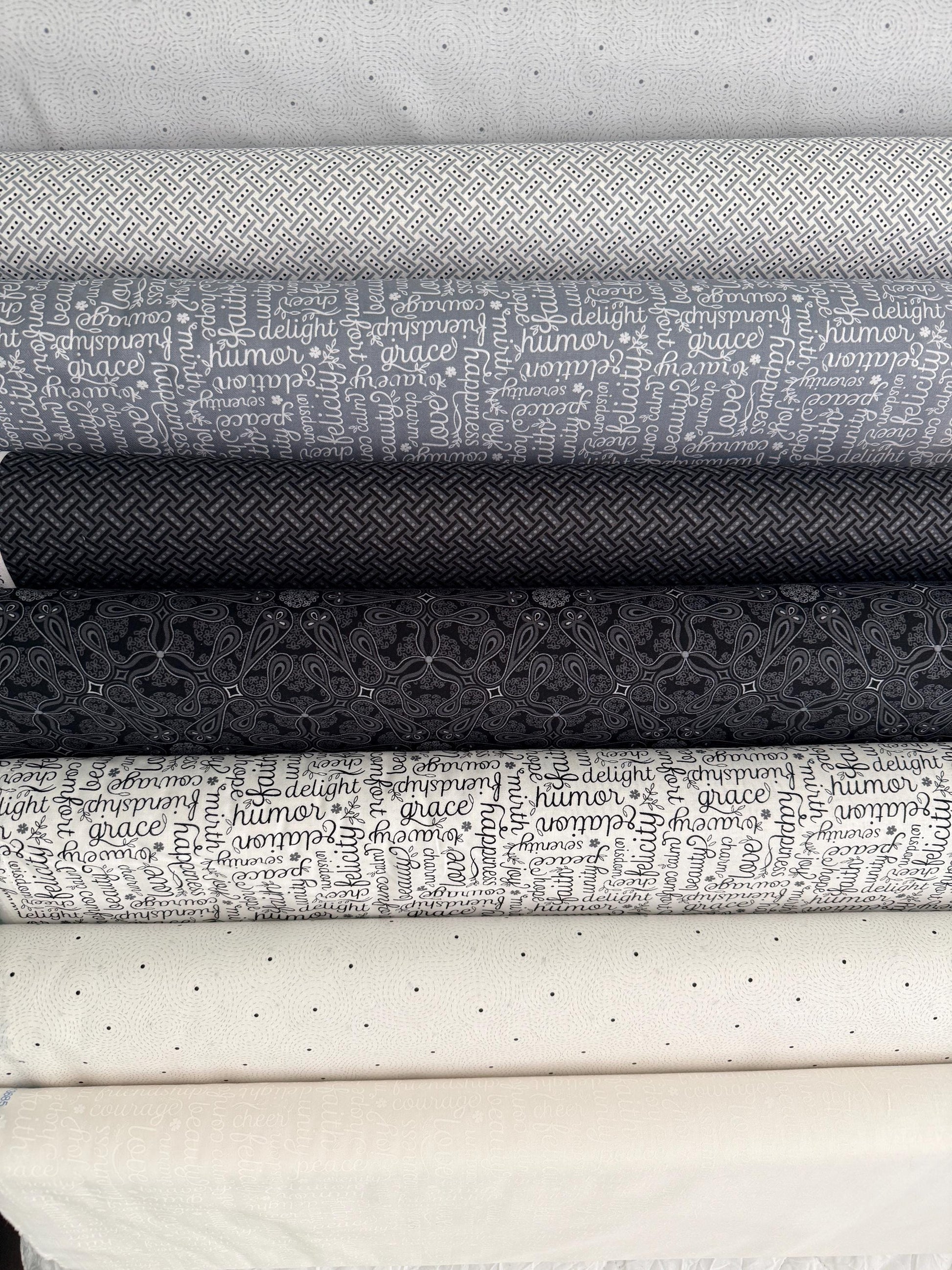 Cotton Fabric White Black Grey Benartex Botanica bundle showcasing various patterns including swirls, script, and basketweave.