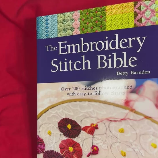 Cover of 'The Embroidery Stitch Bible' by Betty Barnden showing vibrant embroidery designs and essential stitch patterns.